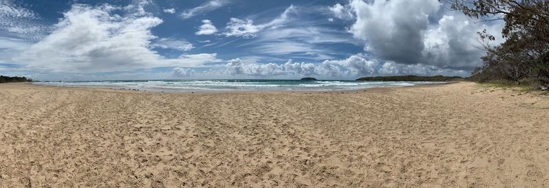 Panoramic view of beach against sky