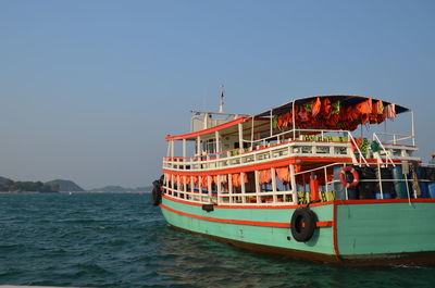 Ship on sea against clear sky