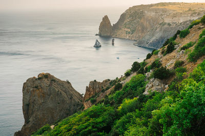 Scenic view of sea and mountains