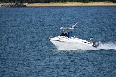 Sailboat sailing in sea