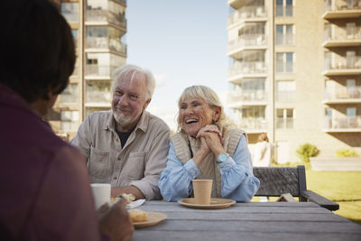 People having coffee together