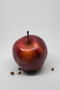 Close-up of apple against white background