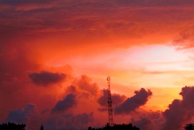 Low angle view of cloudy sky at sunset