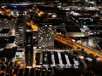 High angle view of illuminated buildings at night