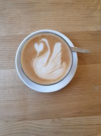 Directly above shot of cappuccino on table