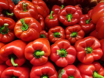 High angle view of red bell peppers for sale in market