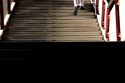 Low section of woman on steps