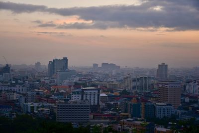 High angle view of buildings against sky during sunset