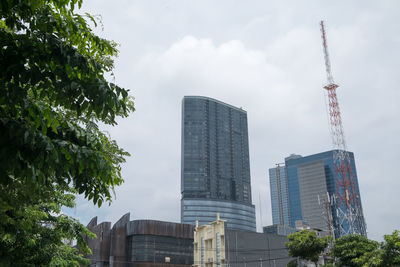 Low angle view of modern buildings against sky