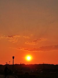 Silhouette of city at sunset