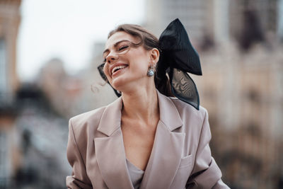 Young woman looking away outdoors