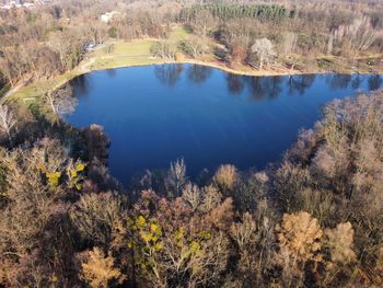 High angle view of lake amidst trees