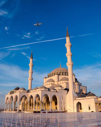 Low angle view of building against blue sky