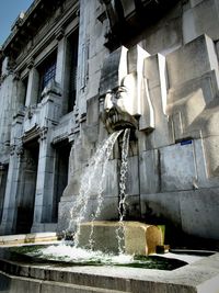 Fountain in front of building