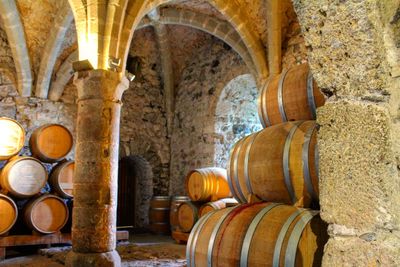 Barrels on floor in old building