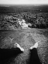 Low section of person relaxing on mountain
