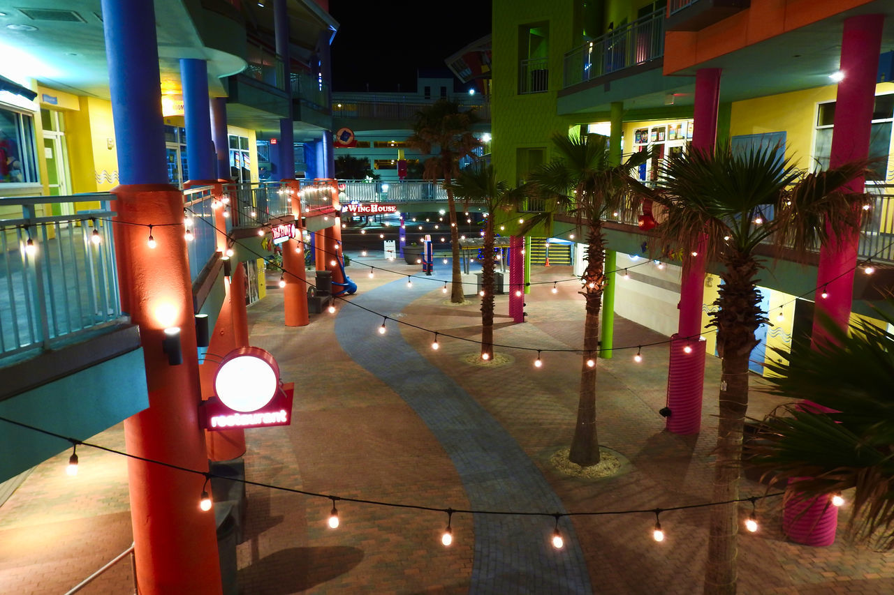 ILLUMINATED STREET LIGHTS AT NIGHT