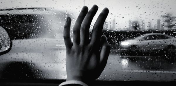 Close-up of raindrops on glass window