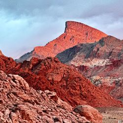 Rock formations on mountain against sky