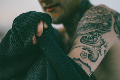 Close-up of tattoos