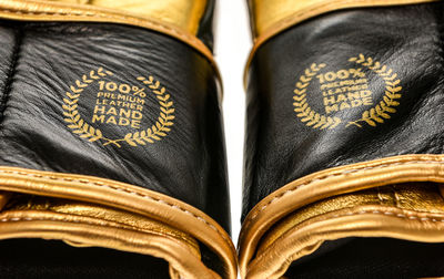 Close up of boxing gloves over white background