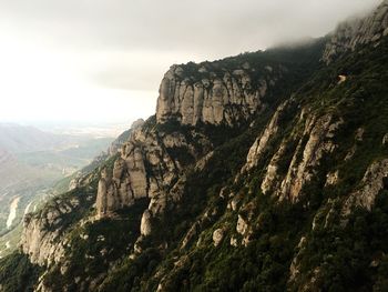 Scenic view of rocky mountains against sky