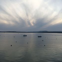 Scenic view of sea against sky at sunset