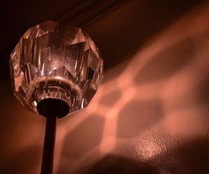 Low angle view of illuminated lamp