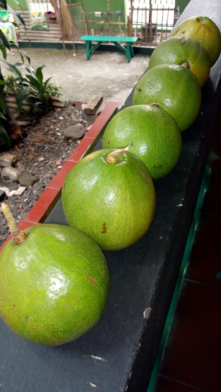 CLOSE-UP OF FRUITS ON TABLE