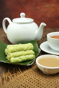 Close-up of tea cup on table