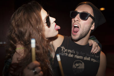 Young couple hanging out at a pool hall