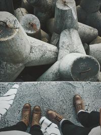 Low section of people standing on concrete