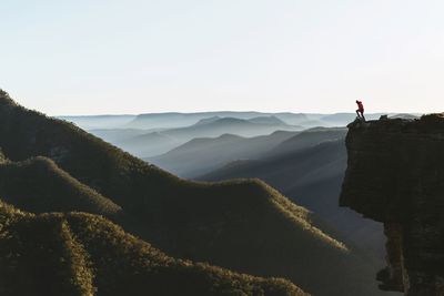 Person standing on cliff