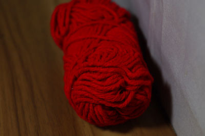 High angle view of red hat on table