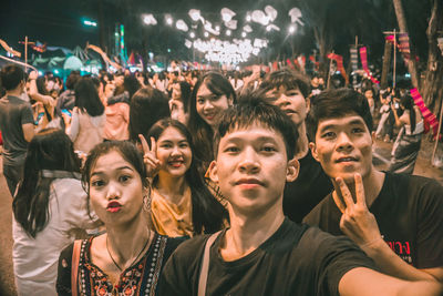 High angle view of people enjoying at music concert