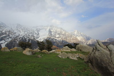 Scenic view of snowcapped mountains against sky