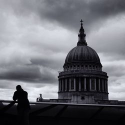 Low angle view of big ben against cloudy sky