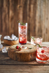 Close-up of drinks on wooden table