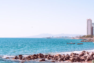 Scenic view of sea against clear sky