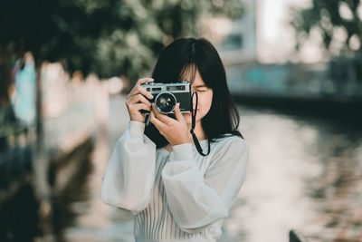 Portrait of man photographing