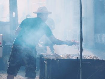 Man working at food stall