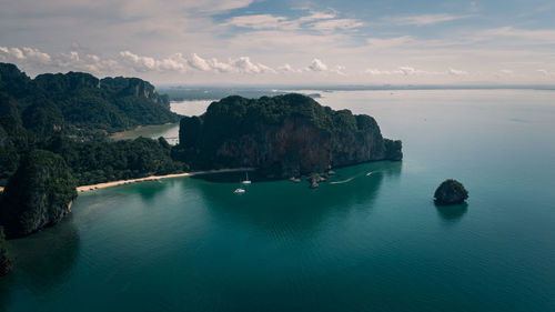 Panoramic shot of sea and rocks against sky