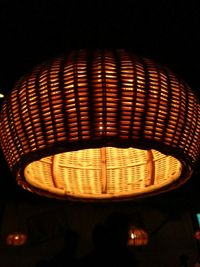 Close-up of illuminated lamp at night