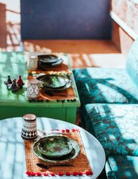 High angle view of breakfast plates on table