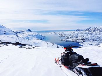 Scenic view of snow covered mountains