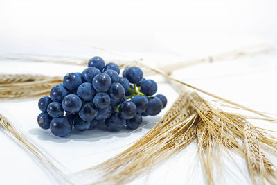 Close-up of grapes on table