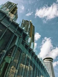 Low angle view of modern buildings against sky