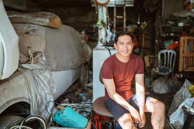 Portrait of man standing on street