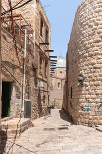 Street amidst old buildings in town