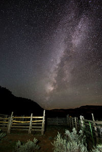 Scenic view of star field against sky at night